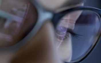 Free Stock Video Screen Information Reflects On A Womans Glasses