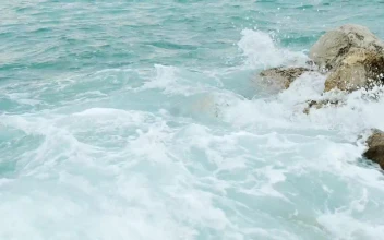 Free Stock Video Sea Waves Reaching A Rocky Shoreline Close Up