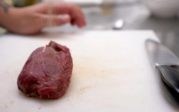Free Stock Video Seasoning Raw Beef Before Cooking