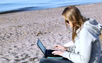 Free Stock Video Sending Emails From The Beach