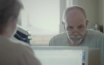 Free Stock Video Senior Man Reading Information On The Computer