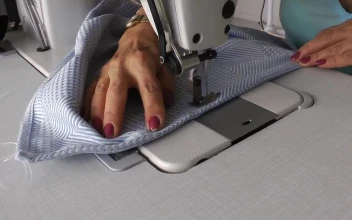 Free Stock Video Sewing A Dress On Machine Close Up