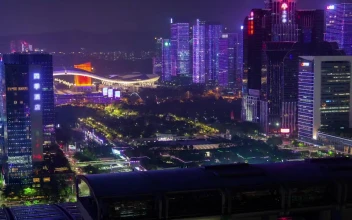 Free Stock Video Shenzhen Cityscape With Projection On Buildings