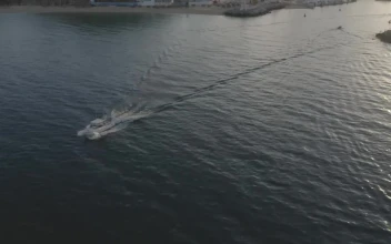 Free Stock Video Ship Leaving A Coast Sailing Fast Through The Sea
