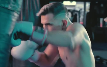 Free Stock Video Shirtless Athlete Training With A Punching Bag