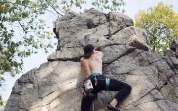 Free Stock Video Shirtless Man Climbing A Rock
