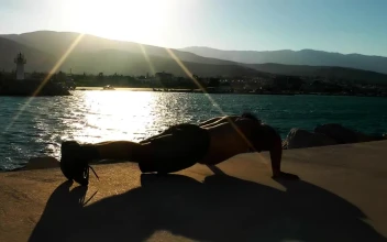 Free Stock Video Shirtless Man Doing Push Ups On The Boardwalk