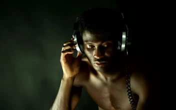 Free Stock Video Shirtless Man Listening To Music With Retro Headphones