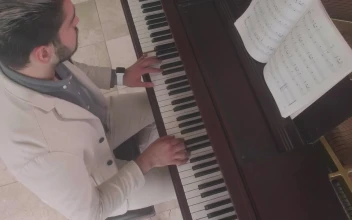 Free Stock Video Shot From Above Of A Musician Playing A Grand Piano