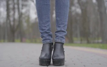 Free Stock Video Shot Of Legs In Jeans Reveals Woman In Face Mask