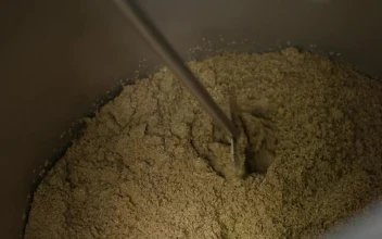 Free Stock Video Shovel Moving Ground Barley In A Tank
