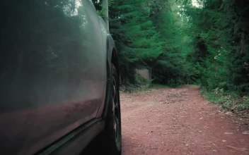 Free Stock Video Side Approach Of A Gray Car Moving Along The Rural