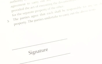 Free Stock Video Signing A Document With Blue Ink