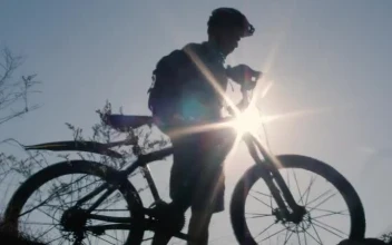 Free Stock Video Silhouette In Front Of The Sun Of A Cyclist Outdoors