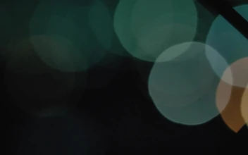 Free Stock Video Silhouette Of A Fence With Defocused Lights In The Background