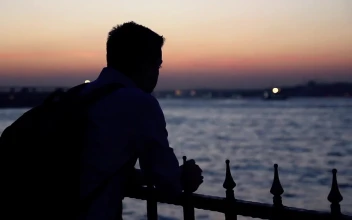 Free Stock Video Silhouette Of A Lonely Man At Dusk Near A River