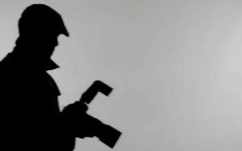 Free Stock Video Silhouette Of A Spy Taking Photos