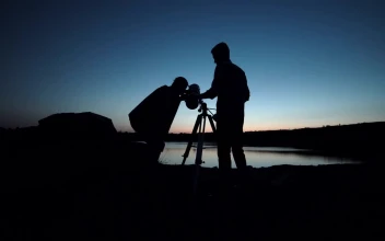 Free Stock Video Silhouettes Of People Using A Telescope At Dusk