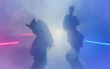 Free Stock Video Silhouettes Of Two Dancers Under Smoke And Colored Lights