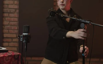 Free Stock Video Singer Arranging Her Microphones In A Recording Studio