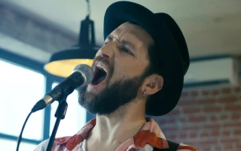 Free Stock Video Singing In A Hat With A Microphone