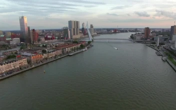 Free Stock Video Single Boat Heading Under The Erasmus Bridge