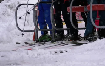 Free Video Stock Skiers Passing Turnstile Gate Of Ski Lift Entrance