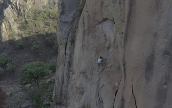 Free Video Stock Skilled Mountaineer Climbing A Gigantic Mountain