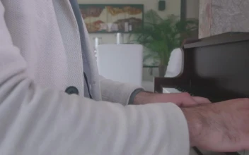 Free Video Stock Skilled Pianist Playing A Grand Piano In An Elegant Lobby