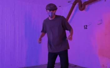 Free Video Stock Skillful Boy Dancing Break Dance With A Face Mask