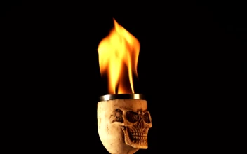 Free Video Stock Skull Shaped Cup With Fire On Black Background