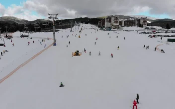 Free Video Stock Sky Lift And Skiers In The Snowy Mountain