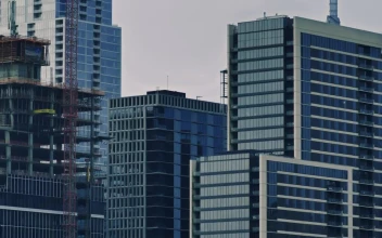 Free Video Stock Skyscrapers Of A Big City From Top To Bottom