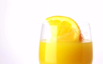 Free Video Stock Slice Of Orange Falling Into The Juice