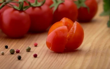 Free Video Stock Sliced Tomato Falls On A Wooden Board