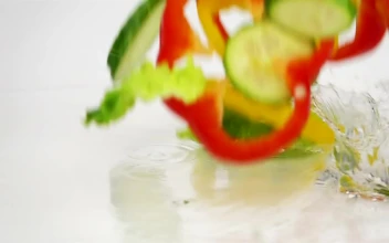 Free Video Stock Slices Of Vegetables Falling Into The Water