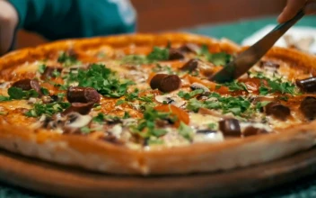 Free Video Stock Slicing A Freshly Baked Pizza