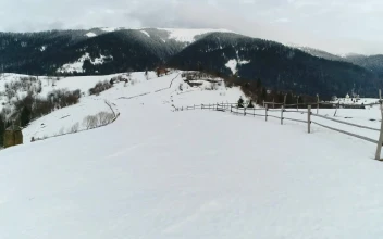 Free Video Stock Slowly Going Down A Snowy Slope On A Mountain