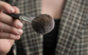 Free Video Stock Slowly Shaking A Powder Makeup Brush