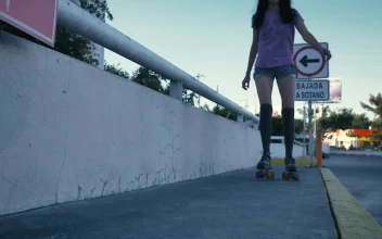 Free Video Stock Slowly Skating Down A Concrete Sidewalk