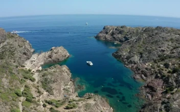 Free Video Stock Small Boat Anchored In A Cove