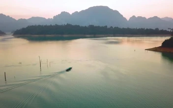 Free Video Stock Small Boat In A Great Heavenly Place