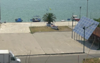 Free Video Stock Small Boats By A Solar Panel