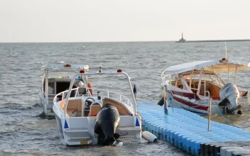 Free Video Stock Small Boats Docked On A Beach Ramp