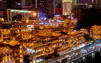 Free Video Stock Small Buildings In A City Covered In Lights