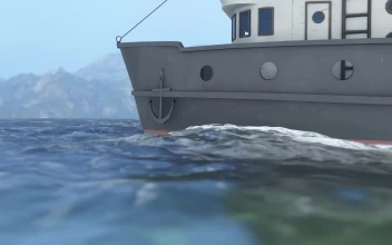 Free Video Stock Small Fishing Boat Sailing In The Sea