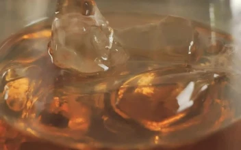 Free Video Stock Small Glass With Whiskey On The Rocks