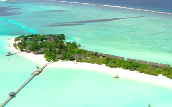 Free Video Stock Small Island Surrounded By Turquoise Sea