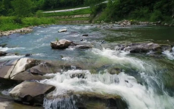 Free Video Stock Small Waterfall In A River In Nature Slow Motion