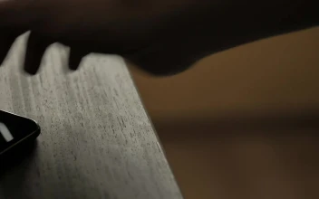 Free Video Stock Smartphone On A Wooden Table